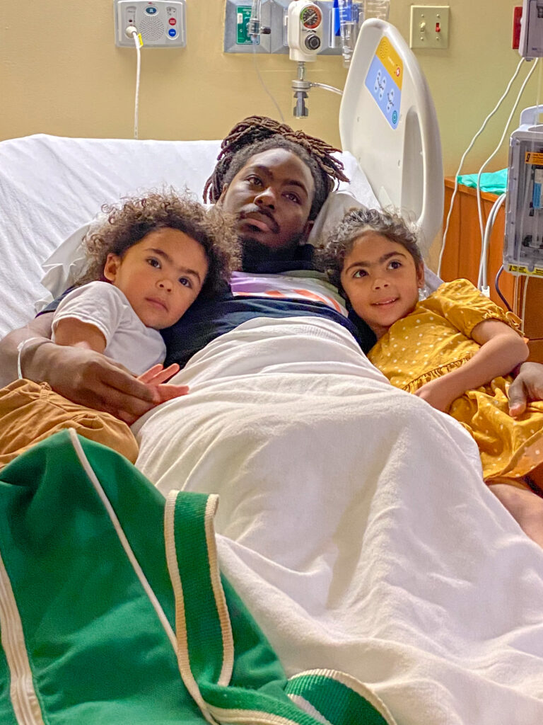 Devonte during one of his hospital stays at SGMC Health with his children
